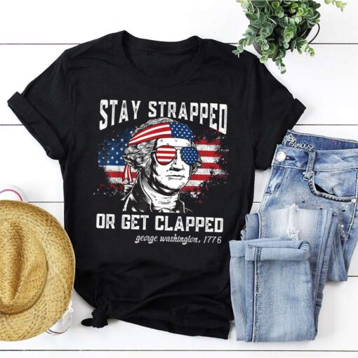 Stay Strapped Or Get Clapped T-Shirt, George Washington With US Flag 1776 Print Tee