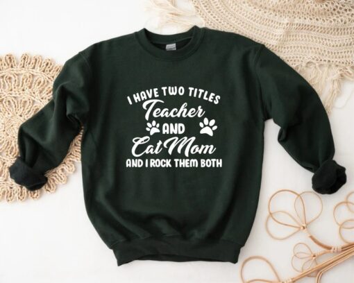 I Have Two Titles Teacher And Cat Mom And I Rock Them Both Sweatshirt