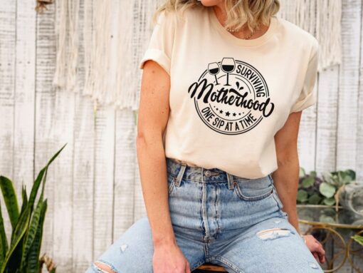 Surviving Motherhood Shirt, Mothers Day Gift, Mama Tee, Gift For Mom, Funny Mom Shirt, Motherhood Crewneck, Wine Shirt